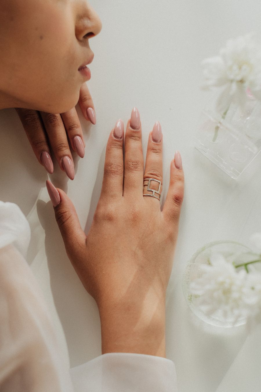 Warm nude almond manicure